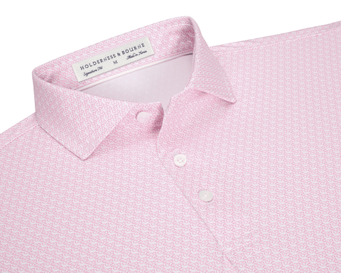 The Griffin Shirt: Belmont, a pink polo with a subtle griffin pattern, features a structured collar and button placket, offering style and sun protection.