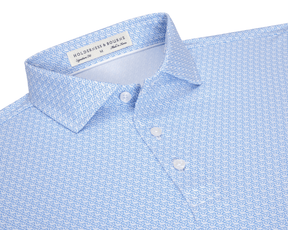 The Griffin Shirt: Horizon Blue, featuring a subtle griffin pattern, three-button placket, and a structured spread collar, crafted for comfort with moisture-wicking and UPF 50+ fabric.