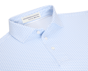 The Atwood Boys Shirt: Horizon Blue features a tiny blue motif on light fabric, with a structured collar and a three-button placket, ideal for active days.