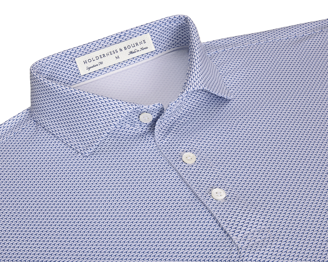 The Armfield Shirt: Andover, a men’s polo with a spread collar, three-button placket, and a subtle geometric pattern, labeled “HOLDERNESS & BOURNE.”