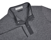 The Sullivan Quarter-Snap: Heathered Charcoal pullover with a stand-up collar, partial snap-button placket, buttery fabric, and diamond-quilted insulation for warmth.