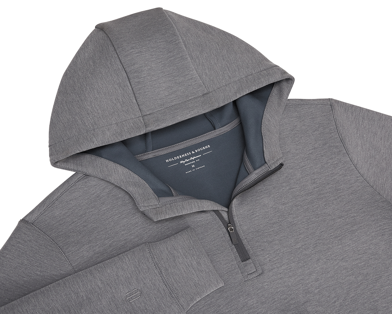 The Tilley Quarter-Zip Hoodie: Heathered Charcoal, features a sleek silhouette with a hood and partial front zipper, showcasing Holderness & Bourne's label. Ideal for versatile wear.