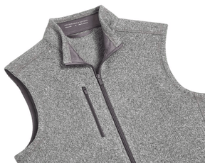 The Ashby Vest: Heathered Gray men's sleeveless zip-up with stand-up collar, zippered chest pocket, and tonal accents. Features a buttery soft interior and H&B embroidery.