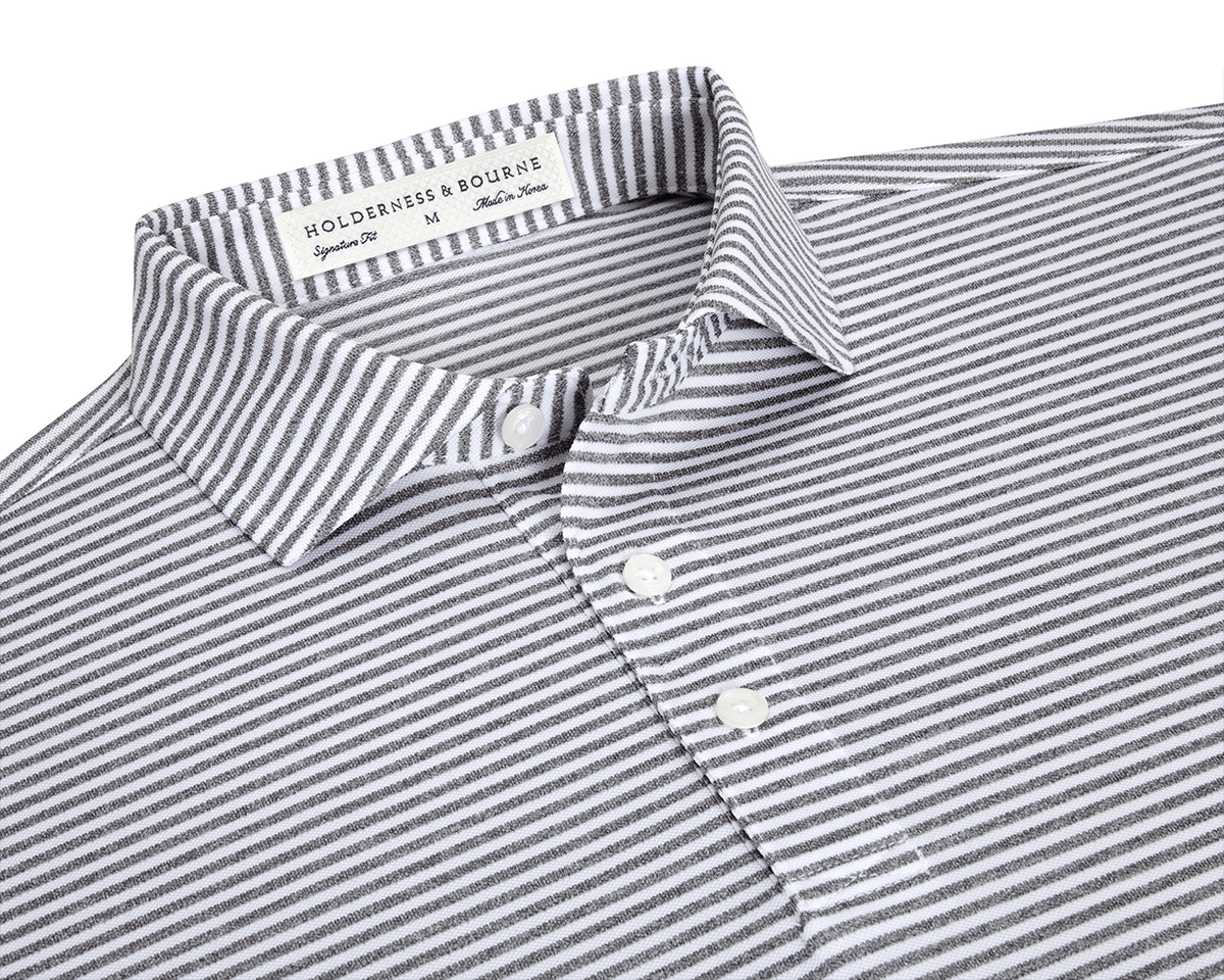 The Maxwell Shirt: Gray & White, a men's striped polo, features a spread collar, three-button placket, and moisture-wicking, UPF 30+ performance pique fabric.