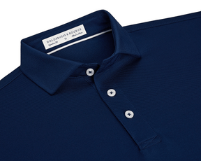 The Macdonald Shirt: Navy, featuring a classic point collar, three-button placket, and contrast collar band piping, offering breathable comfort with a structured spread collar.