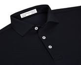 The Macdonald Shirt: Black, featuring a three-button placket, spread collar, and contrast piping, offers breathable comfort with its lightweight synthetic and stretch fibers.