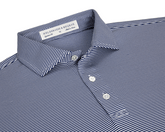 The Perkins Shirt: Navy & White features a micro-stripe knit with a point collar, three-button placket, and moisture-wicking performance fabric for versatile wear.
