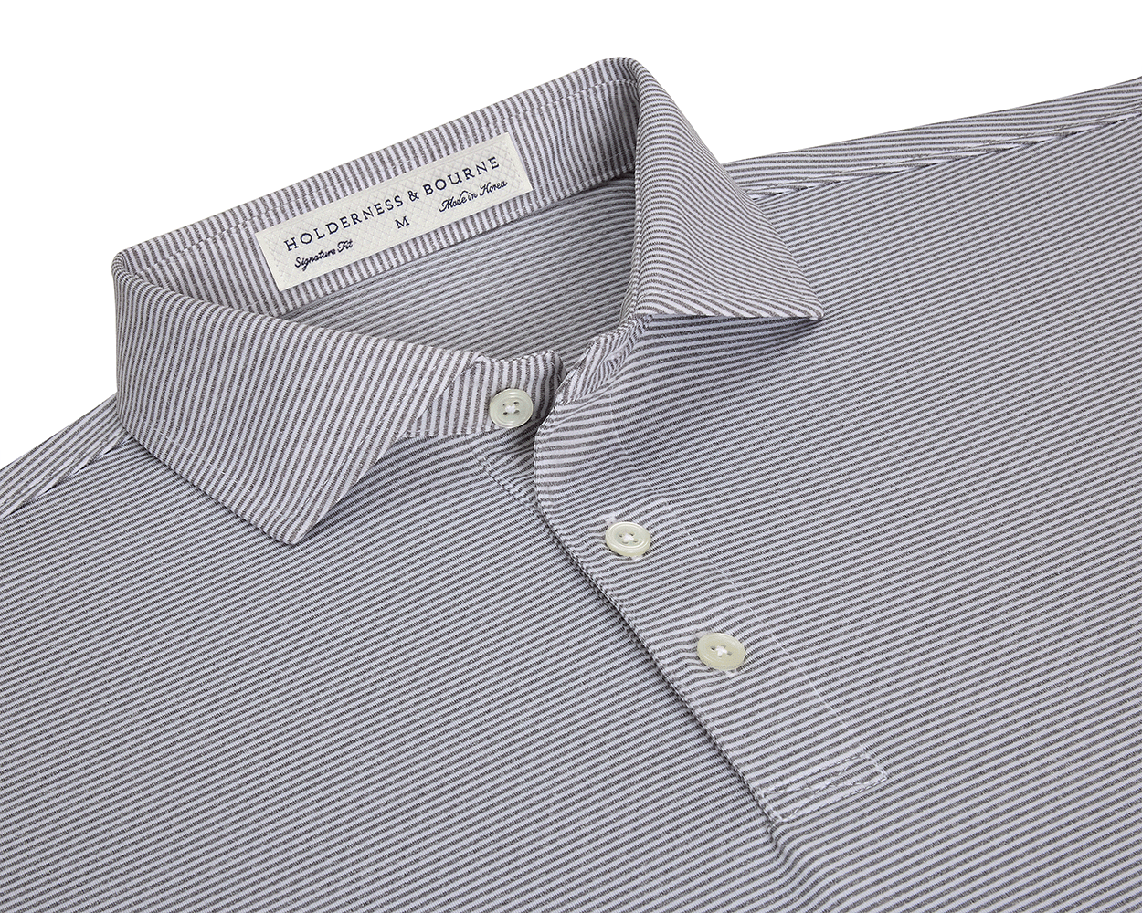 The Perkins Shirt: Gray & White, features a finely striped polo design with a structured collar, three-button placket, and performance fabric for comfort and protection.