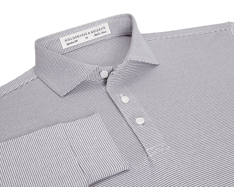 The Burke Shirt: Gray & White, featuring narrow stripes, a structured spread collar, three-button placket, cuffed sleeve, and Holderness & Bourne label, offers UPF 50+ protection.