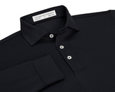 The Farrell Shirt: Black, features a long-sleeve polo design with light buttons, a spread collar, and Holderness & Bourne label, offering comfort and moisture wicking.