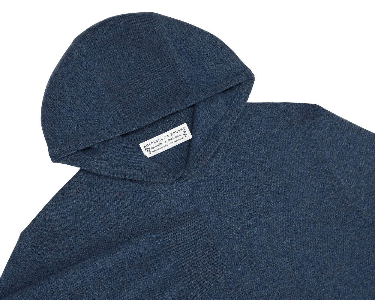 The Logan Hoodie Sweater: Heathered Andover, showcasing a blue knitted Merino wool/cashmere blend, features a hood, ribbed cuffs, and smooth stockinette body.