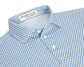 The Kitts Boys Shirt: Bedford features a light-blue-and-white houndstooth pattern with a structured collar, white buttons, and a turtle print for added playfulness.