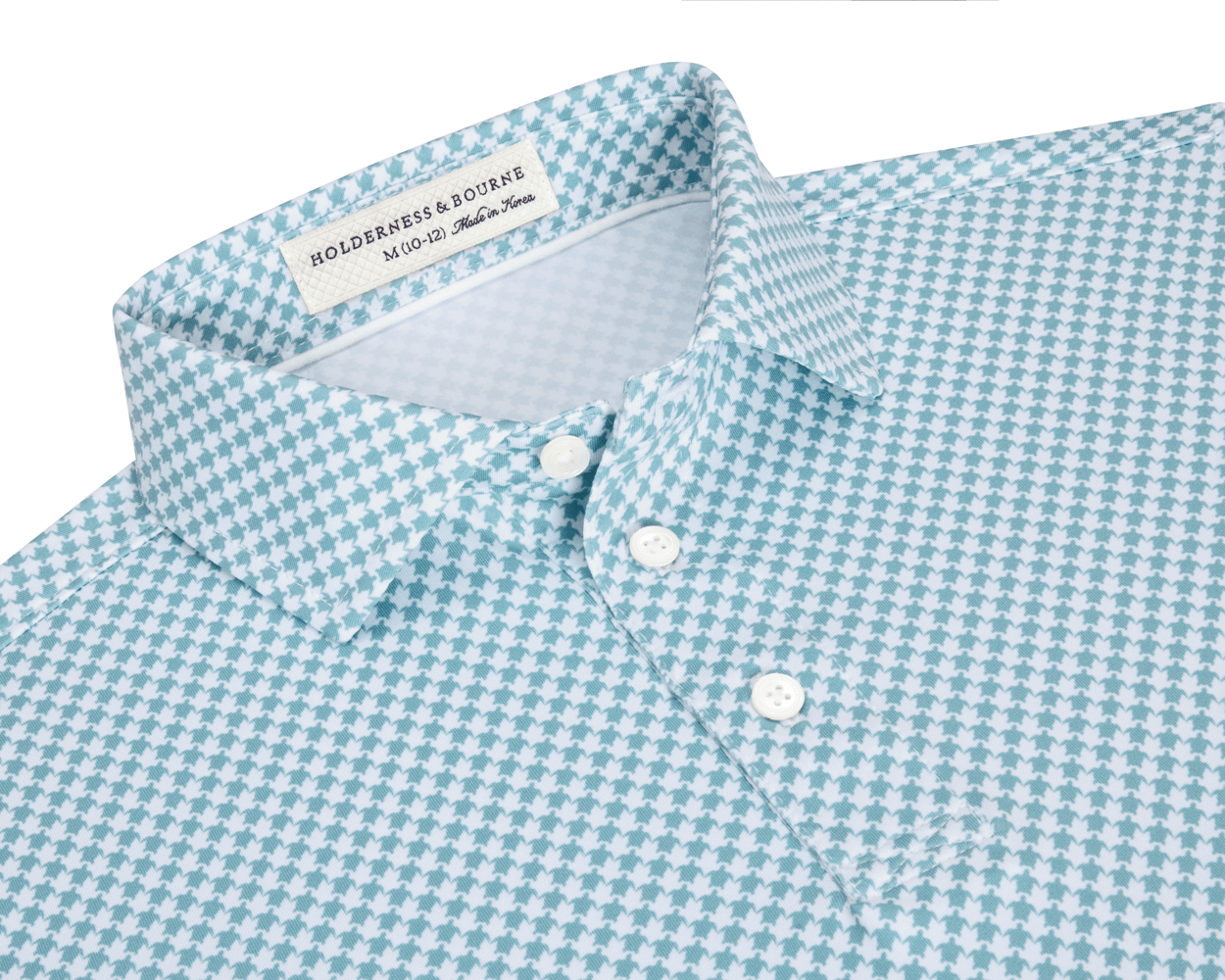 The Kitts Boys Shirt: Harbor, featuring a blue-green and white houndstooth pattern, point collar, three-button placket, and Holderness & Bourne label.