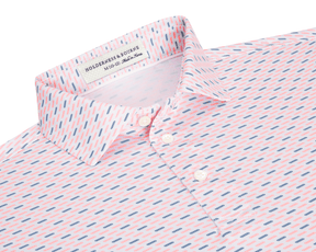 The James Boys Shirt: Cape & Andover features a light polo with coral and navy dash pattern, structured collar, and three white buttons.