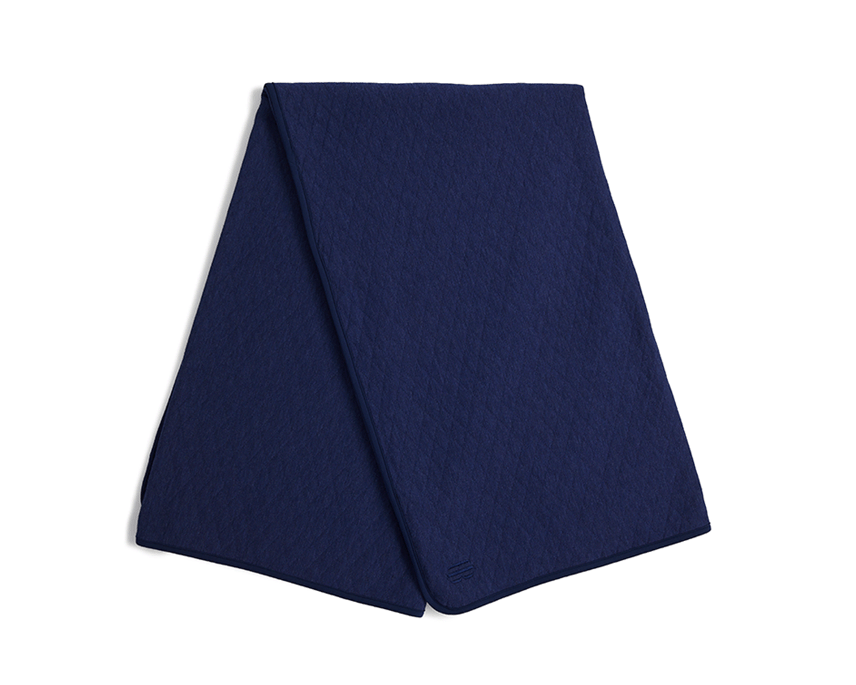 The Van Pelt Blanket: Heathered Navy, a quilted textile featuring diamond-stitch texture and finished edges, ideal for cozying up by the firepit or relaxing at home.