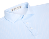 The Griffin Shirt: Vista Blue, featuring a light-blue geometric print, structured collar, and three-button placket, designed for comfort and versatility with performance fabric.