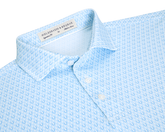 The Rivers Shirt: Vista Blue & Horizon Blue features a light-blue polo with a subtle horseshoe print, spread collar, and three-button placket, highlighting Holderness & Bourne's craftsmanship.