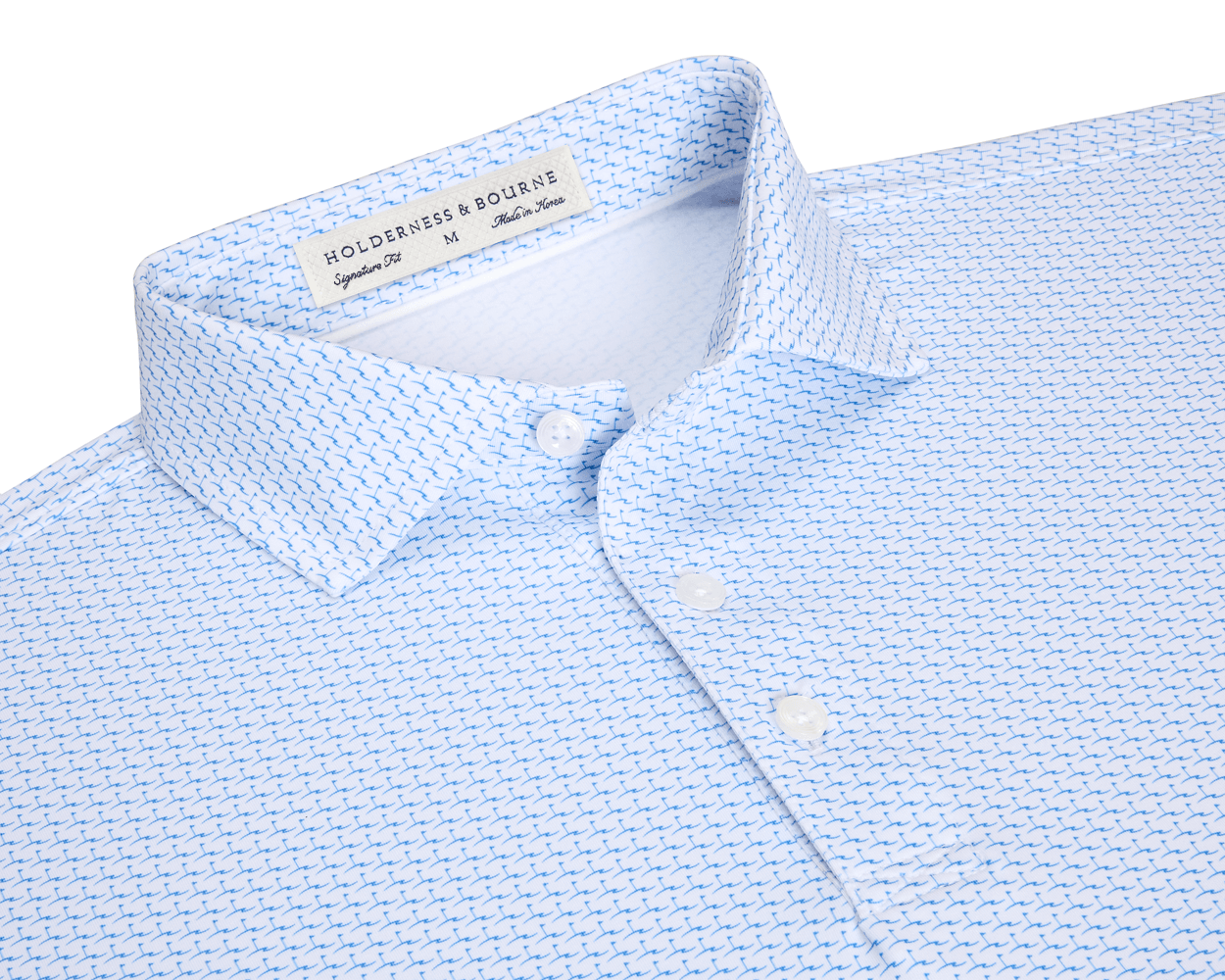 The Atwood Shirt: Horizon Blue features a light-blue button-down with a blue-plane motif, structured spread collar, and white buttons, ideal for versatile, active wear.