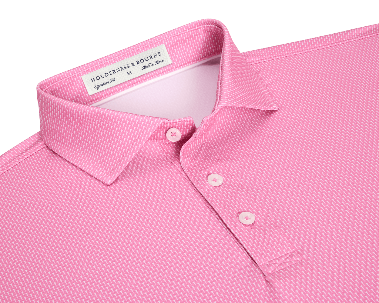 The Hicks Shirt: Belmont features a geometric golf-tee pattern, three-button placket, and structured collar, crafted for performance with moisture wicking and UPF 50+ protection.