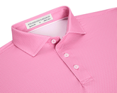 The Hicks Shirt: Belmont features a geometric golf-tee pattern, three-button placket, and structured collar, crafted for performance with moisture wicking and UPF 50+ protection.