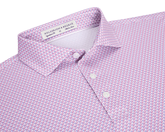 The Justice Shirt: Horizon Blue & Cabernet, featuring a light pink polo with a blue-and-white chevron pattern, three-button placket, and Holderness & Bourne label.