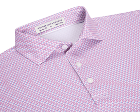 The Justice Shirt: Horizon Blue & Cabernet, featuring a light pink polo with a blue-and-white chevron pattern, three-button placket, and Holderness & Bourne label.