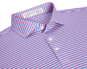The Fleming Shirt: Horizon Blue/Belmont/White, a folded polo with narrow stripes, three-button placket, spread collar, and Holderness & Bourne neck label, offering stretch and sun protection.