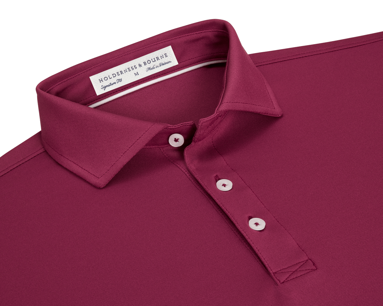 Close-up of The Macdonald Shirt: Cabernet, showcasing a structured spread collar, three-button placket, and contrast collar band piping, featuring the Holderness & Bourne woven label.