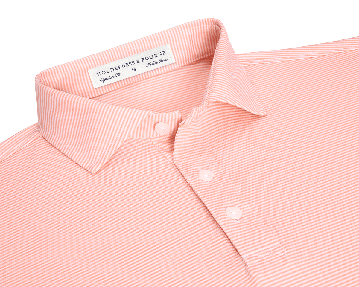 The Perkins Shirt: Nectarine & White features light coral with fine white stripes, classic polo collar, three-button placket, and Holderness & Bourne label.