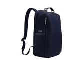 The Broughton Backpack: Navy Ballistic - Slate Blue Embroidery, featuring a sleek design with zippered compartments, padded straps, and personalized initials CMB on the front.