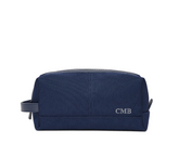 The Littler Dopp Kit: Navy Ballistic - Slate Blue Embroidery, featuring a monogram, top zipper, side handle, and water-resistant interior and exterior.