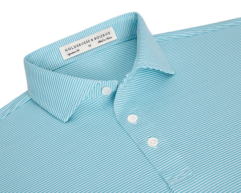 The Perkins Shirt: Harbor & White, an aqua-green polo with thin white stripes, features a point collar, three-button placket, and Holderness & Bourne label.
