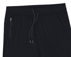 The Saunders Short: Black athletic joggers featuring an elastic waistband with drawstring, zippered pocket, and smooth lightweight fabric for optimal performance.