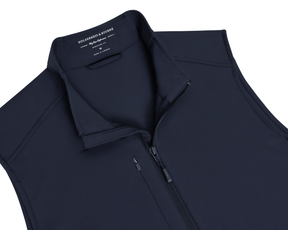 The Boyd Vest: Navy, a sleeveless, zip-up performance vest with stand collar, featuring Holderness & Bourne branding, designed for wind and water resistance with four-way stretch.