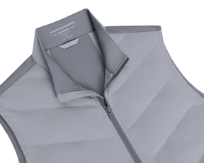 The Benton Vest: Gray features a quilted puffer design with a stand-up collar, full zipper, and visible Holderness & Bourne branding inside the collar.