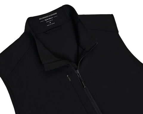 The Boyd Vest: Black, a sleek, black windbreaker with a stand-up collar and two-way zipper, features windproof, water-resistant fabric with four-way stretch for flexibility.