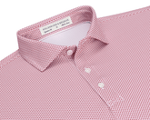 The Armfield Shirt: Liberty Red, featuring a red-and-white geometric print, classic point collar, three-button placket, and Holderness & Bourne label, ideal for golfing performance.