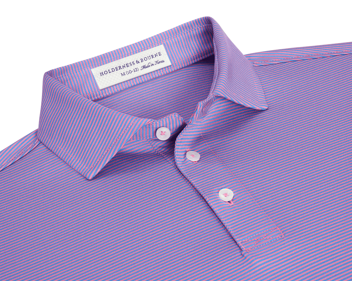 The Perkins Boys Shirt: Horizon Blue & Belmont features fine pink and blue stripes, a structured collar, three-button placket, and is crafted from breathable DryLuxe fabric.