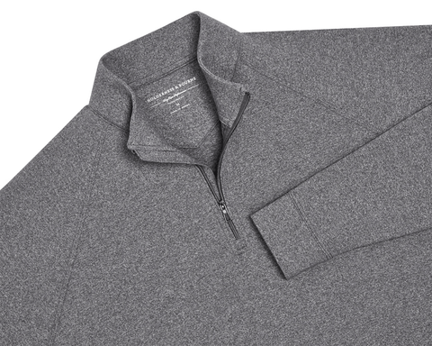 The Westland Quarter-Zip: Charcoal, featuring a heather-gray design with a quarter-zip and standing collar, offers moisture-wicking comfort and visible shoulder stitching.