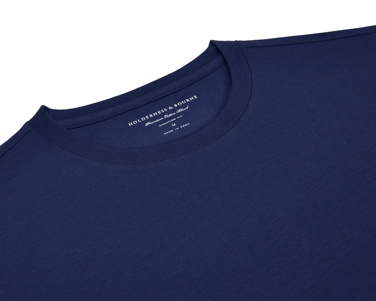 The Mason T-Shirt: Navy, a crewneck made from midweight Peruvian pima cotton blend, showcasing Holderness & Bourne branding inside the neckline. Size Medium.