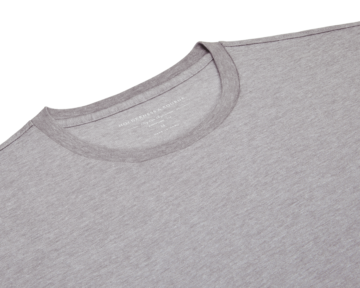 The Mason T-Shirt: Heathered Gray, showcasing its crew-neck, light-gray fabric with visible collar and shoulders, highlighting the luxurious Peruvian pima cotton blend.