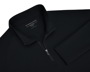 The Stuart Quarter-Zip: Black pullover with a ribbed texture, standing collar, and logo zipper. Features a soft interior and Holderness & Bourne label.