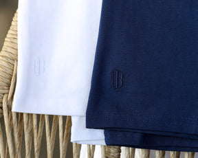 Holderness & Bourne Men’s Pima Cotton White T-Shirt and navy logo close up