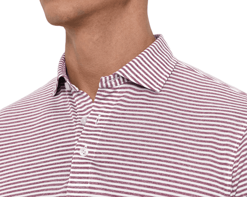 Close-up of a model wearing The Maxwell Shirt: Heathered Napa & White, showing the spread collar, placket with two buttons, and fine horizontal stripes.