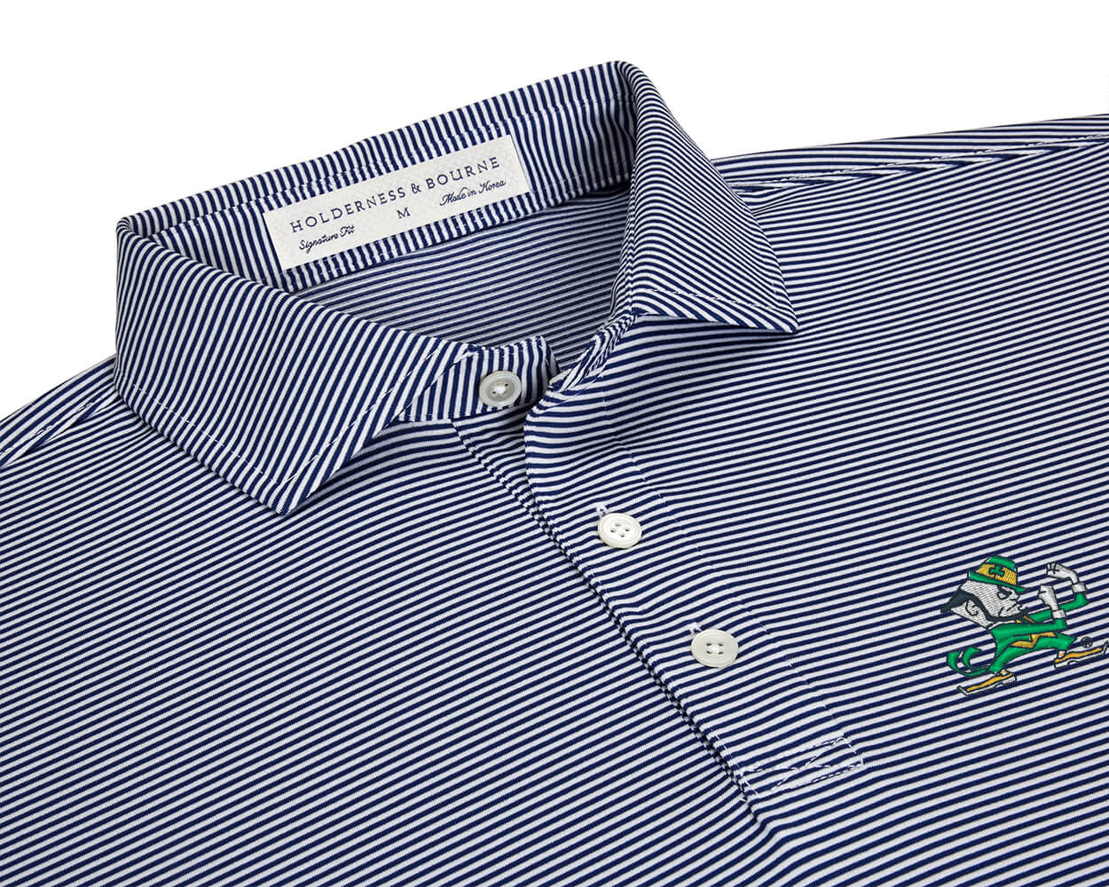 Close-up of University of Notre Dame Perkins Shirt: Navy & White showing the fine pinstripe spread collar, white buttons, and embroidered leprechaun logo.