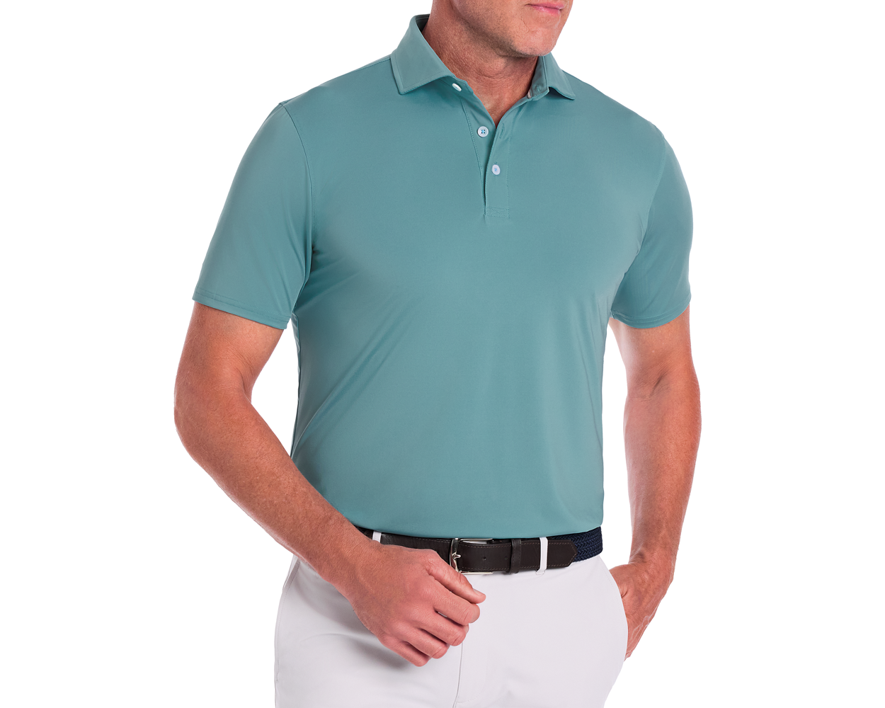 Man wearing The Anderson Shirt: Harbor, a polo with a structured collar, tucked into white pants with a black belt, hand on belt buckle.