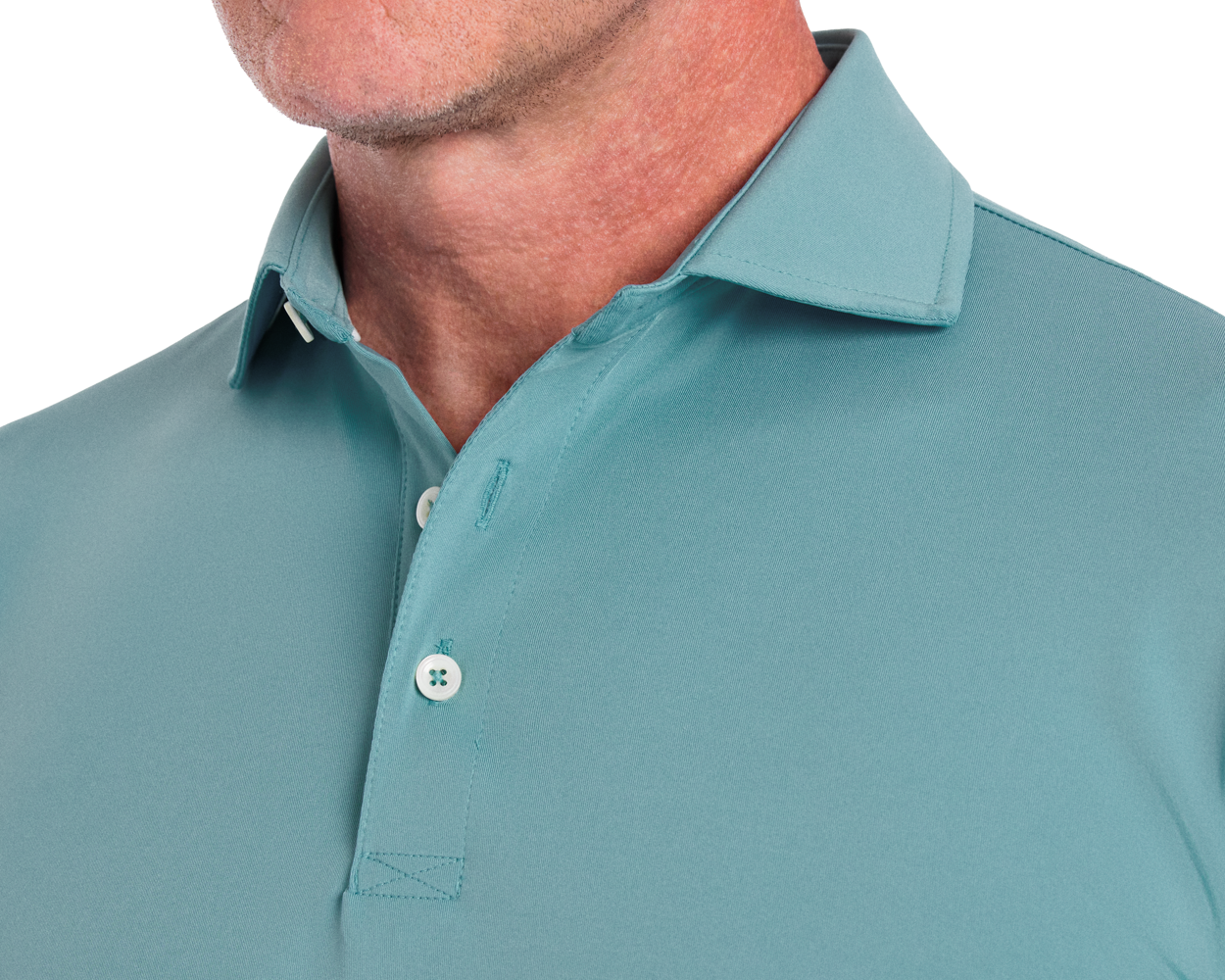 Man wearing The Anderson Shirt: Harbor, showcasing a teal polo with structured spread collar, visible stitching, and two buttons, highlighting jersey knit performance fabric.