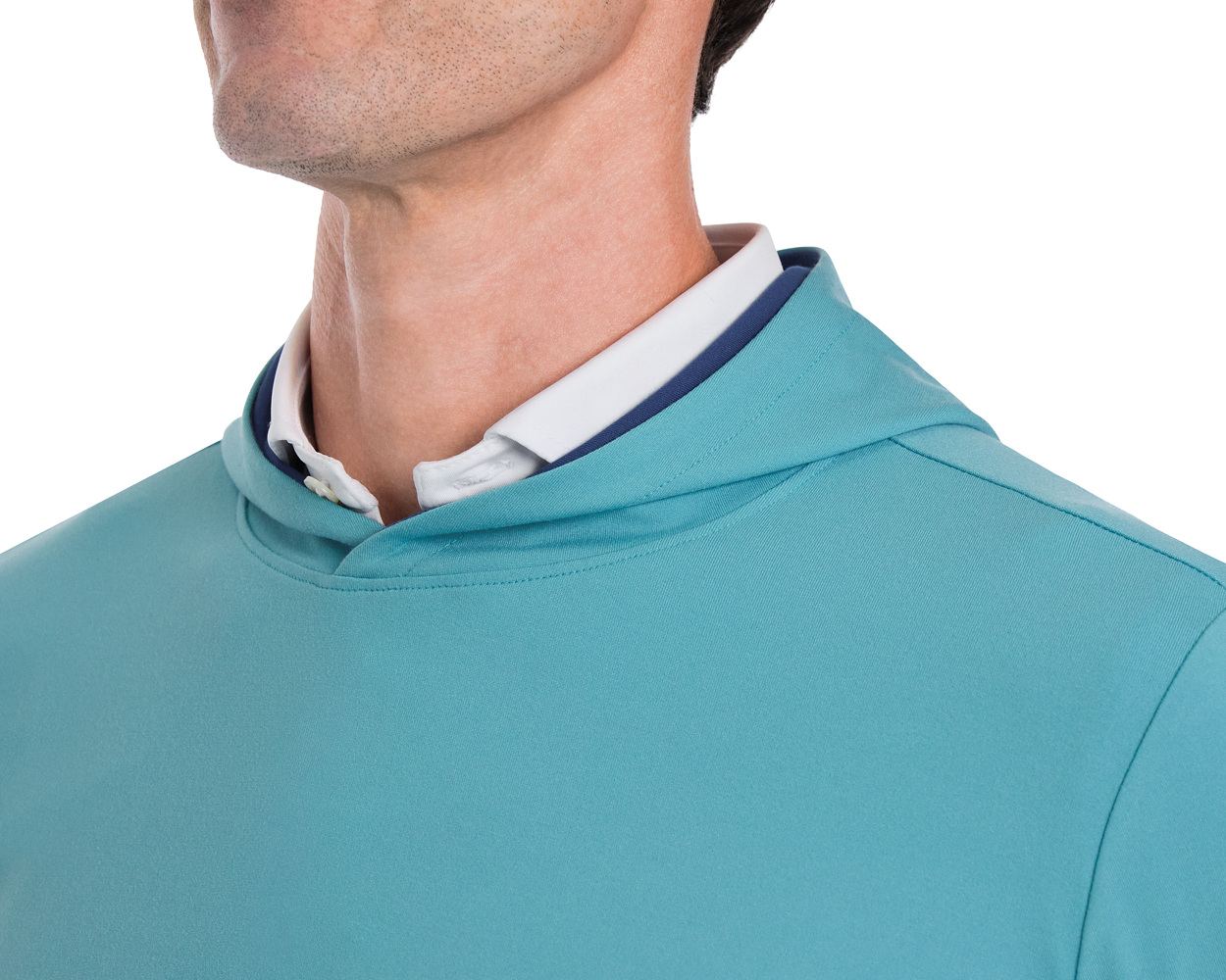 The Jackson Hoodie: Harbor shown on a person, layered over a white collared shirt, features a streamlined design without drawstrings or pouches for optimal performance.