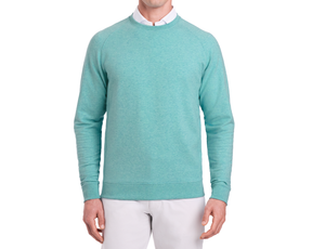 The Kennedy Crewneck: Heathered Harbor shown over a white collared shirt, highlighting its soft terry interior and shape-retaining fit for versatile wear.