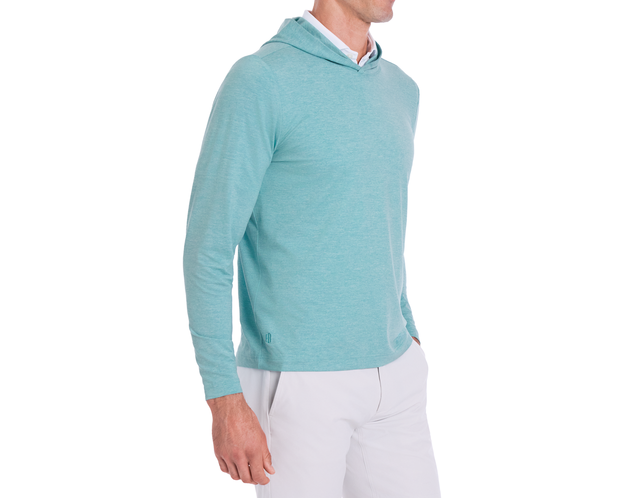 The Stowe Hoodie: Heathered Harbor shown on a male model, featuring a light teal color, long sleeves, set-in design, and athletic drop-tail hem.